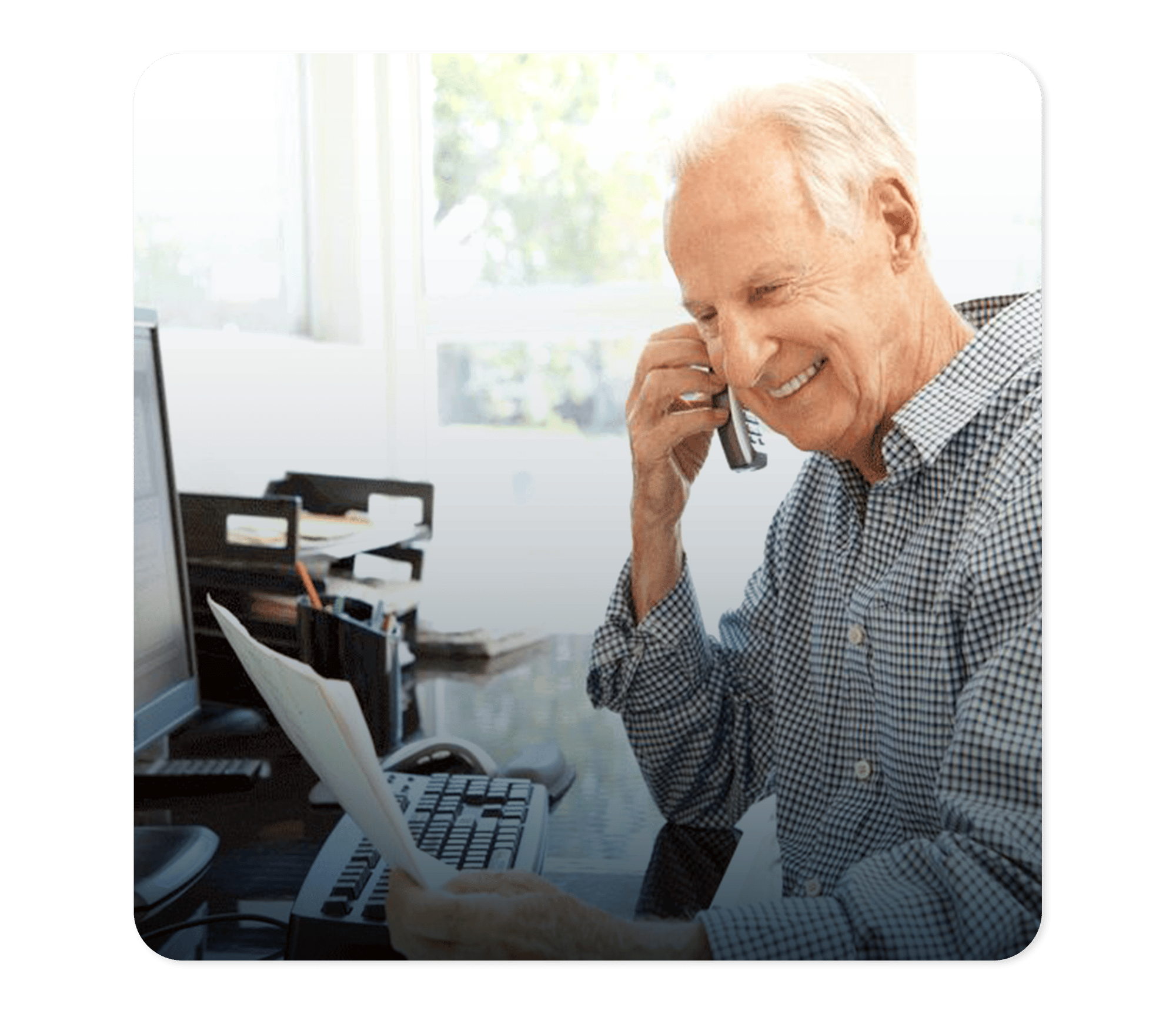 Member looking at paper and calling someone in the phone